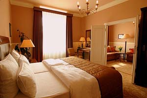 4 person deluxe 2 room apartment with city view, an extra bed, and private facilities (bath and shower)